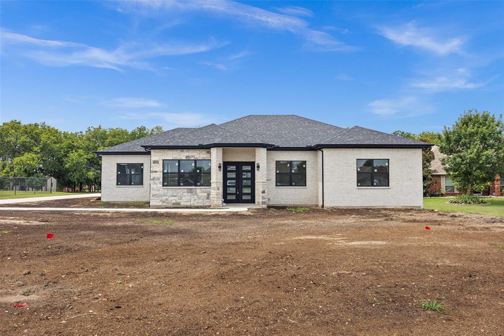 front view of a house with a patio