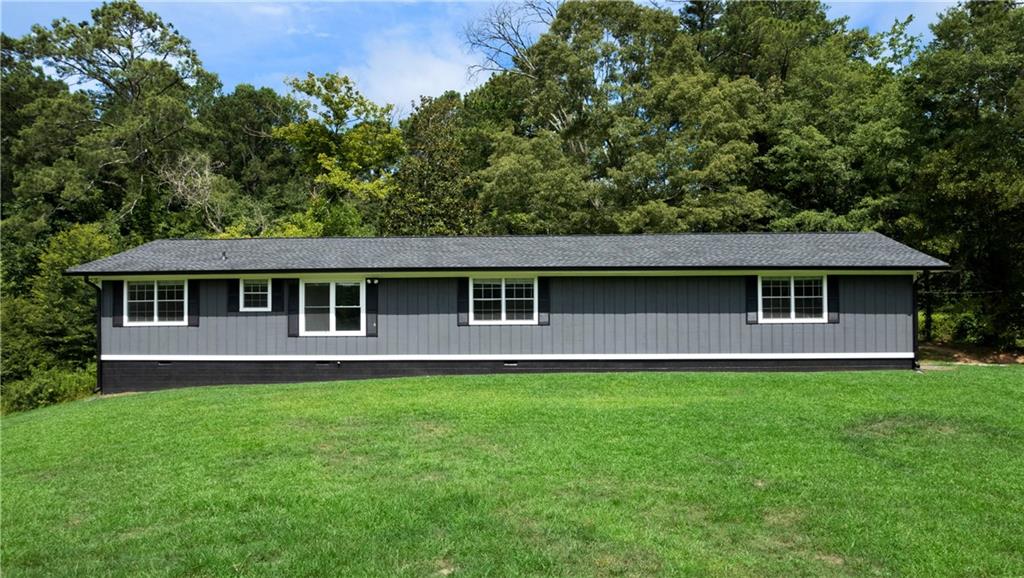 front view of a house with a yard