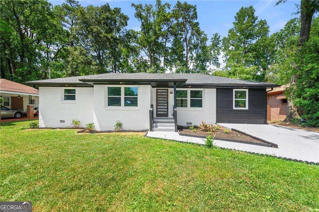 front view of a house with a patio