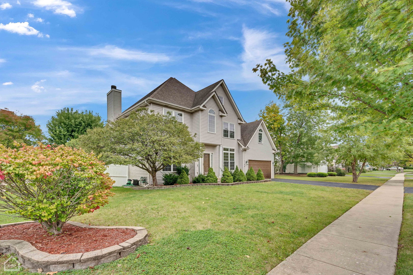 a house view with a garden space