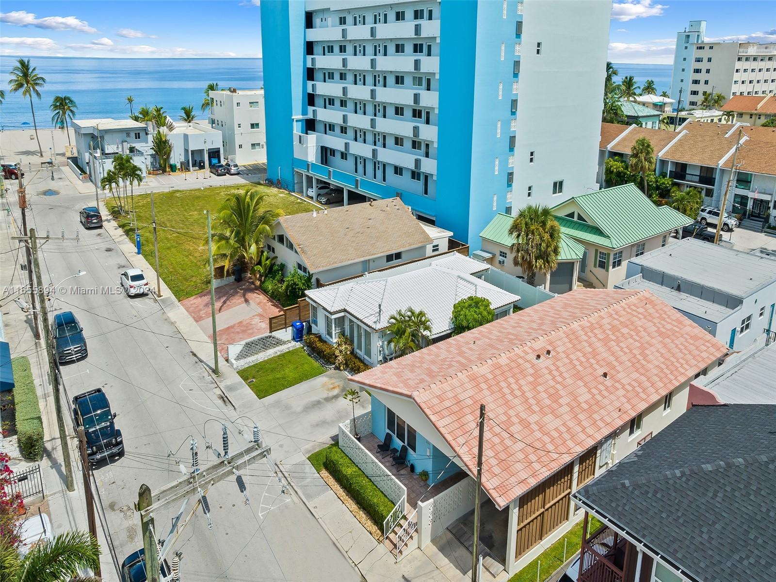 an aerial view of a balcony with chairs