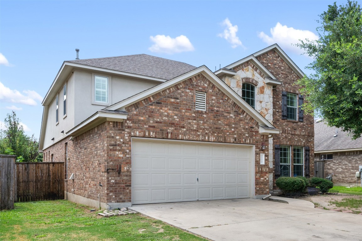 a view of a house with a garage