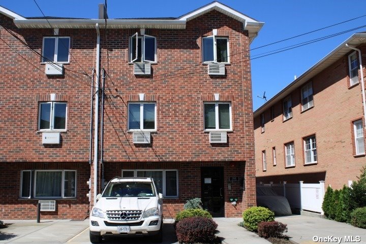 a car parked in front of a building