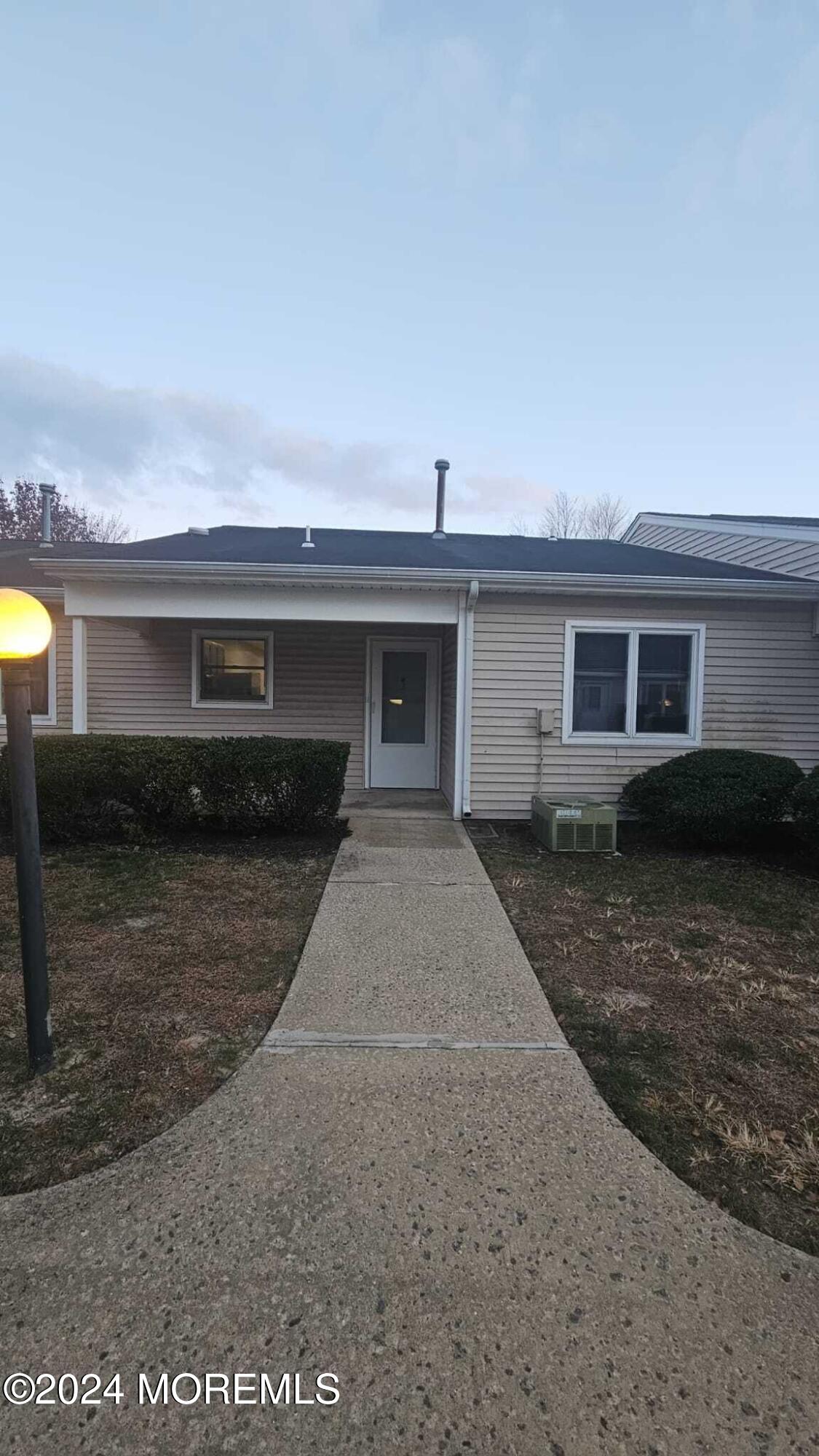 a front view of house with yard