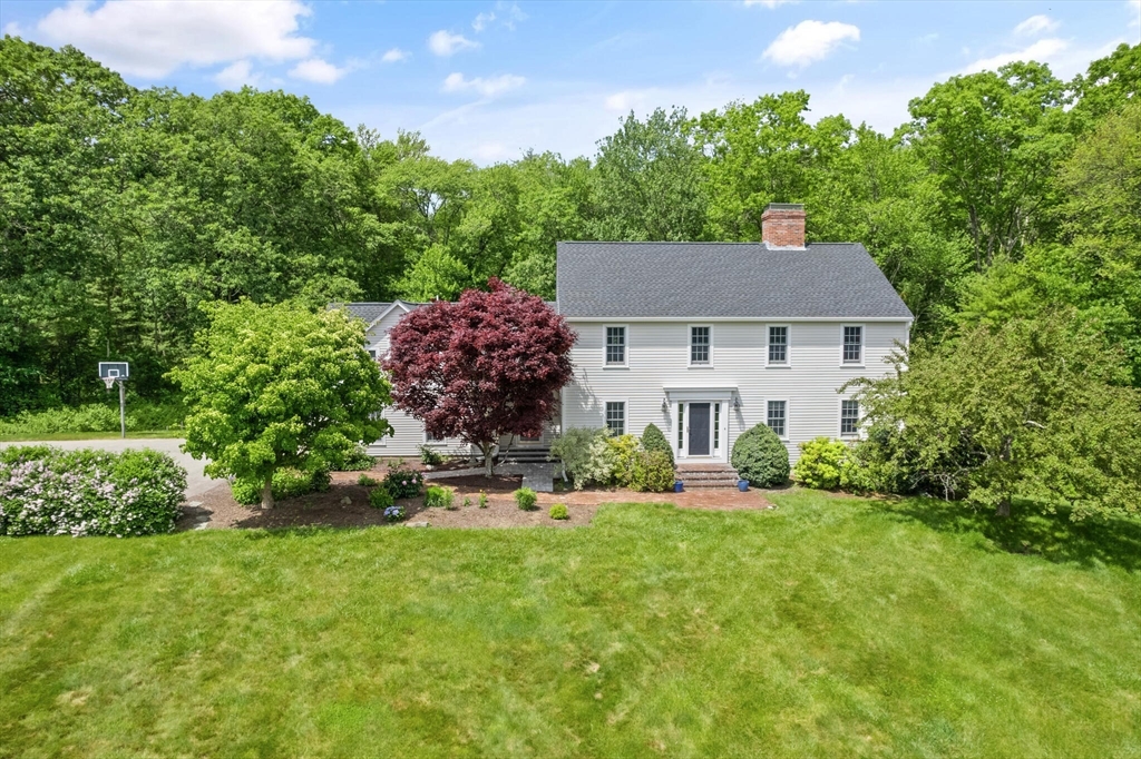 a house view with a garden space