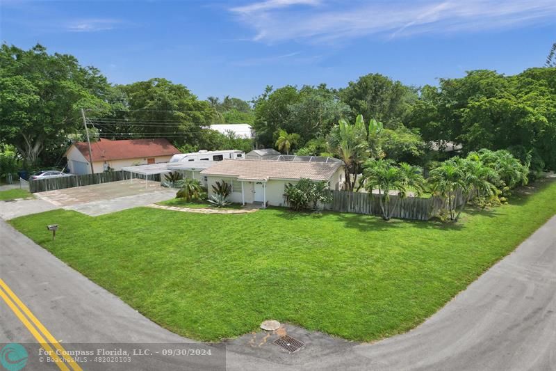 a view of a garden with an outdoor space