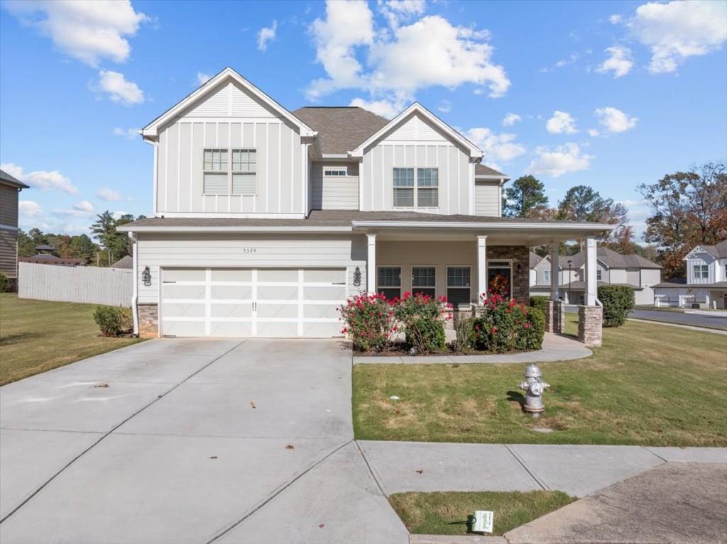 front view of a house with a yard