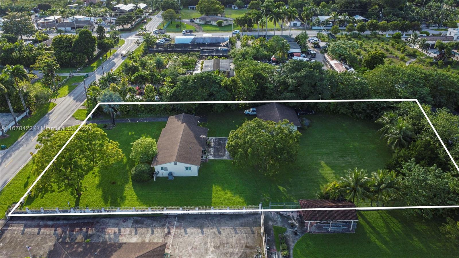 a view of a yard from a balcony