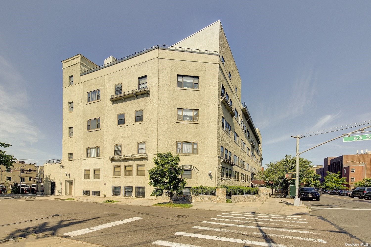 a view of a building with a street