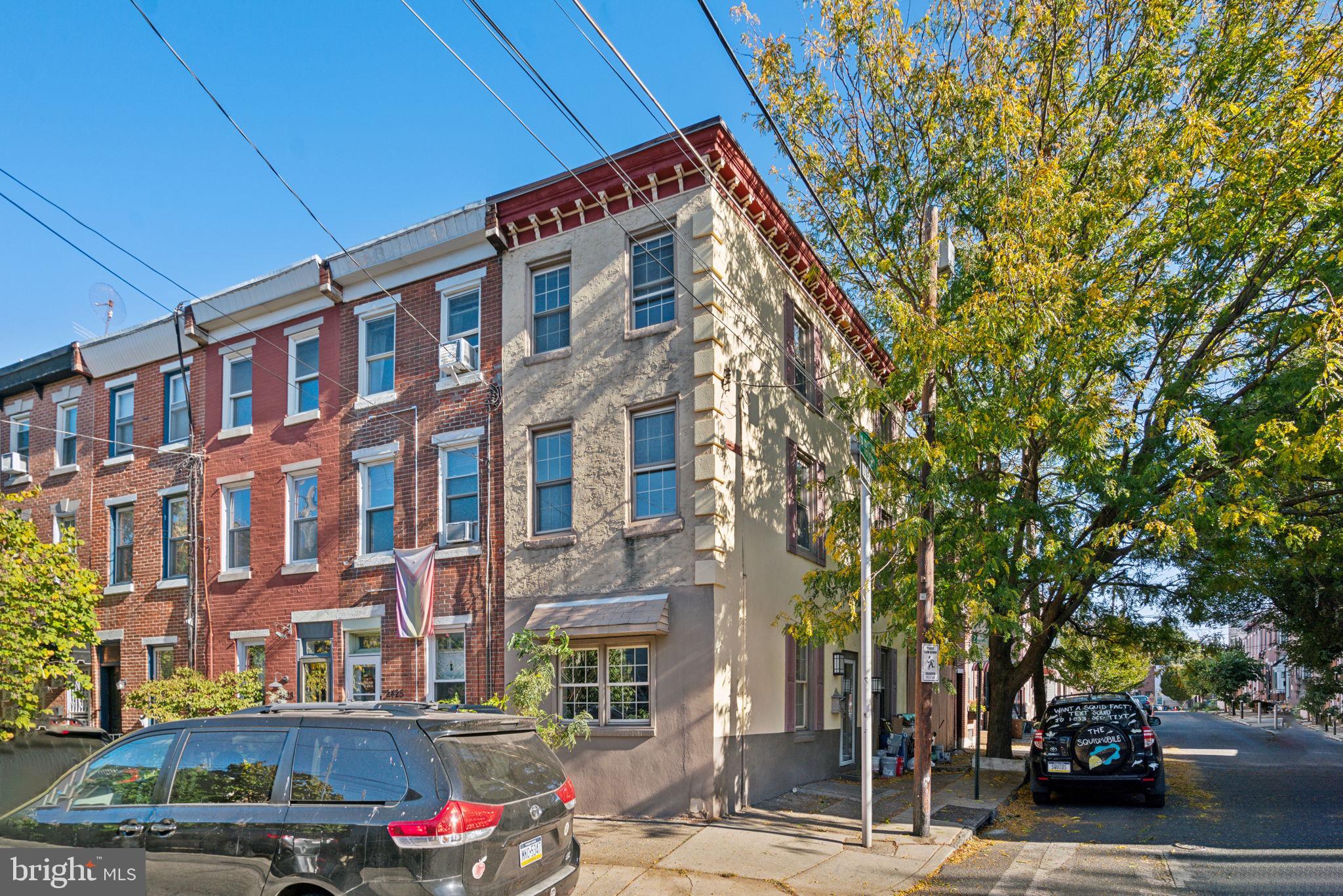 a front view of a building with street view