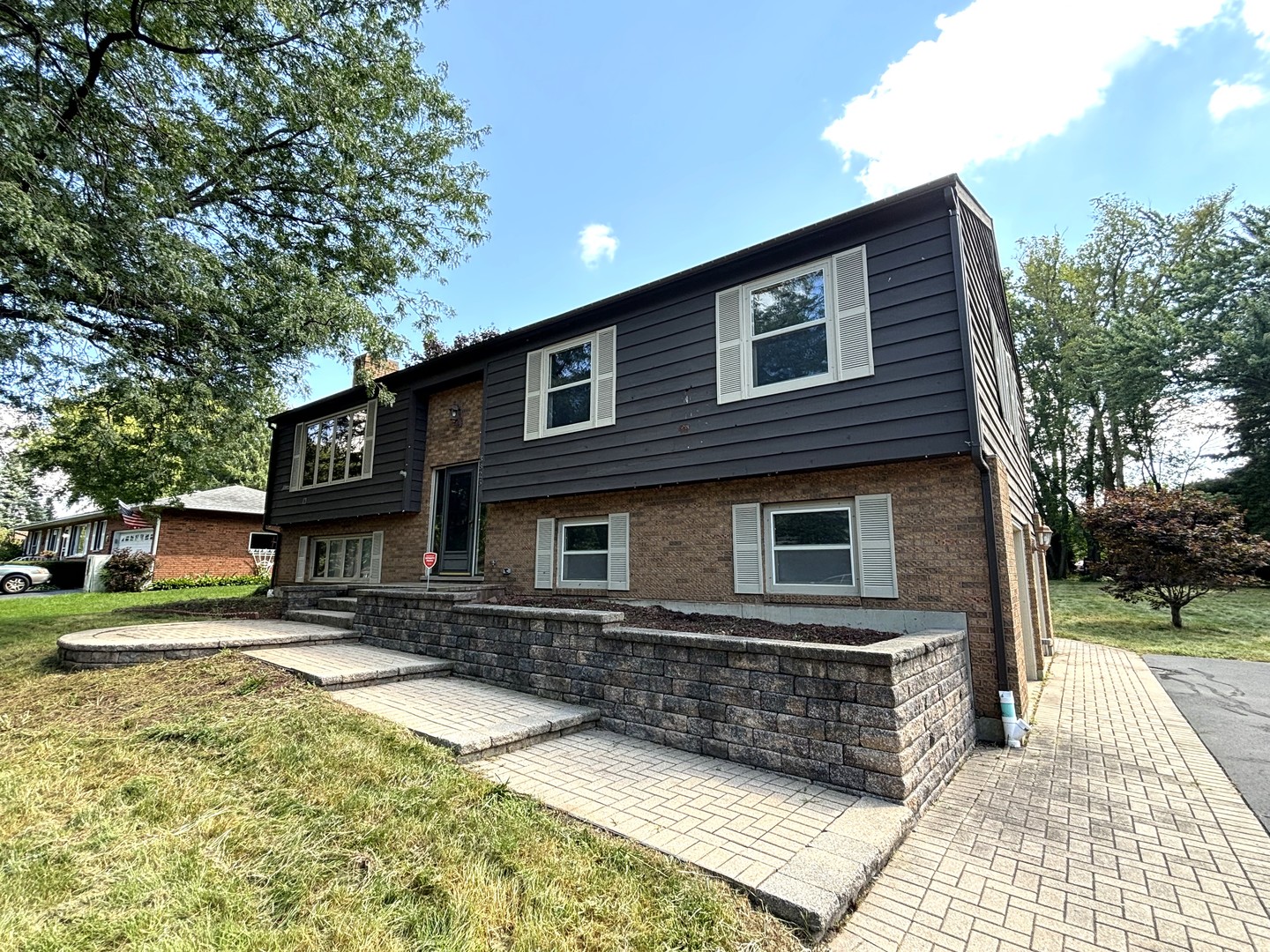 a front view of a house with yard