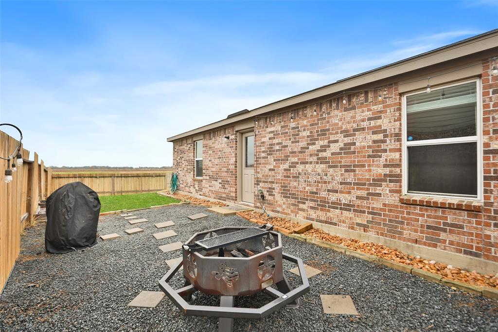 This expansive seating area offers the perfect spot for gathering with friends or unwinding in the evening.