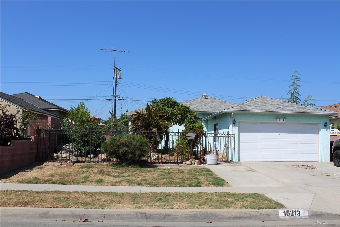 a view of a house with a street