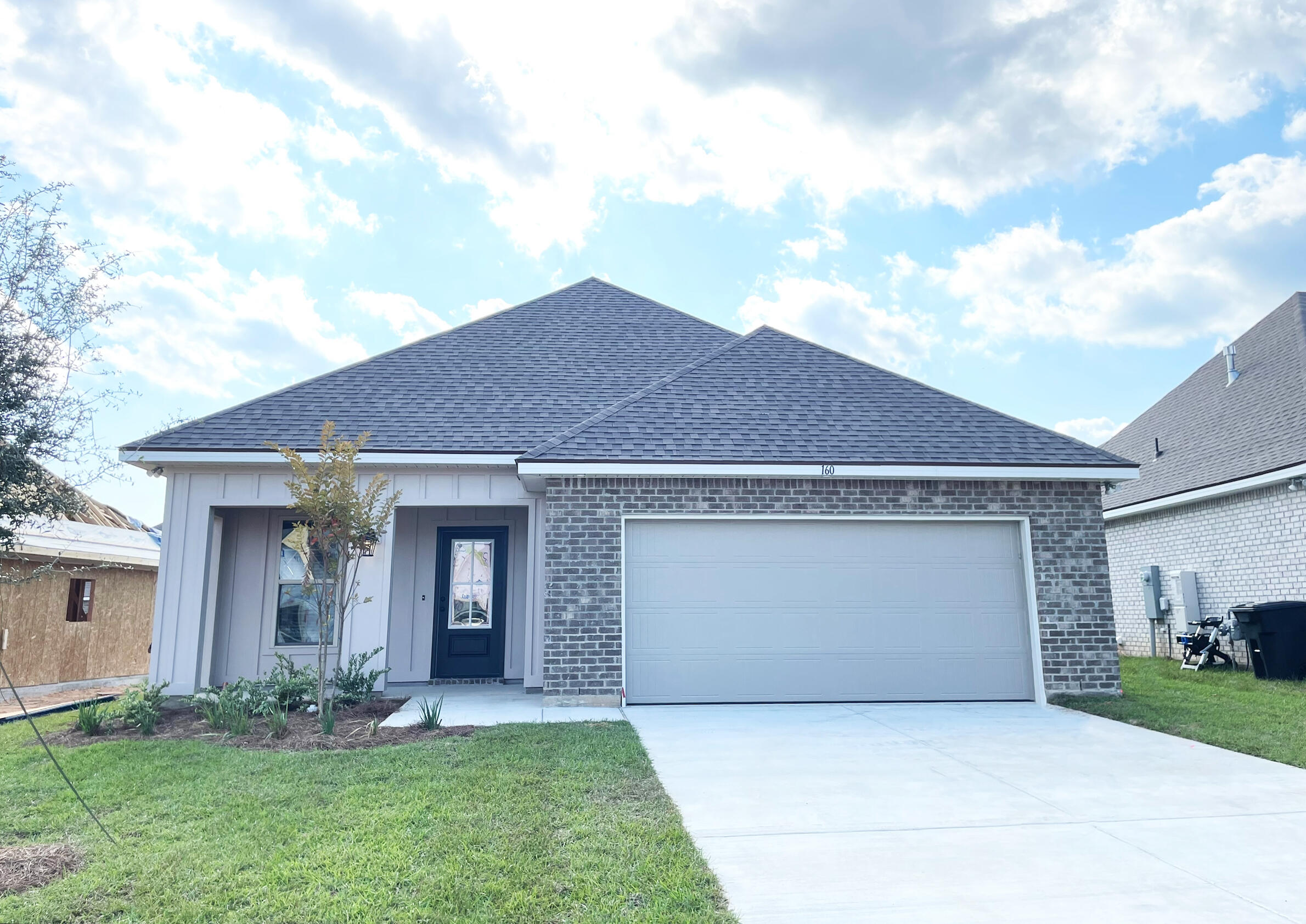 front view of house with a yard