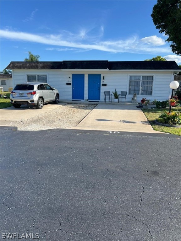 a car parked in front of garage