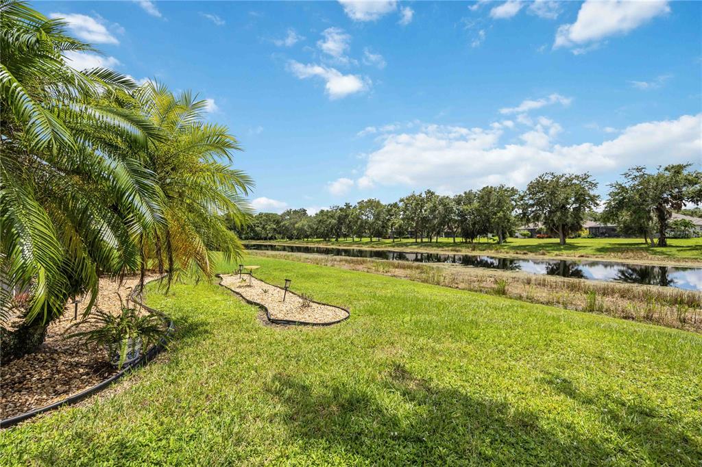 Meticulously maintained landscaping in front of home creating great curb appeal.  432 Snapdragon Loop, Bradenton, FL 34212 