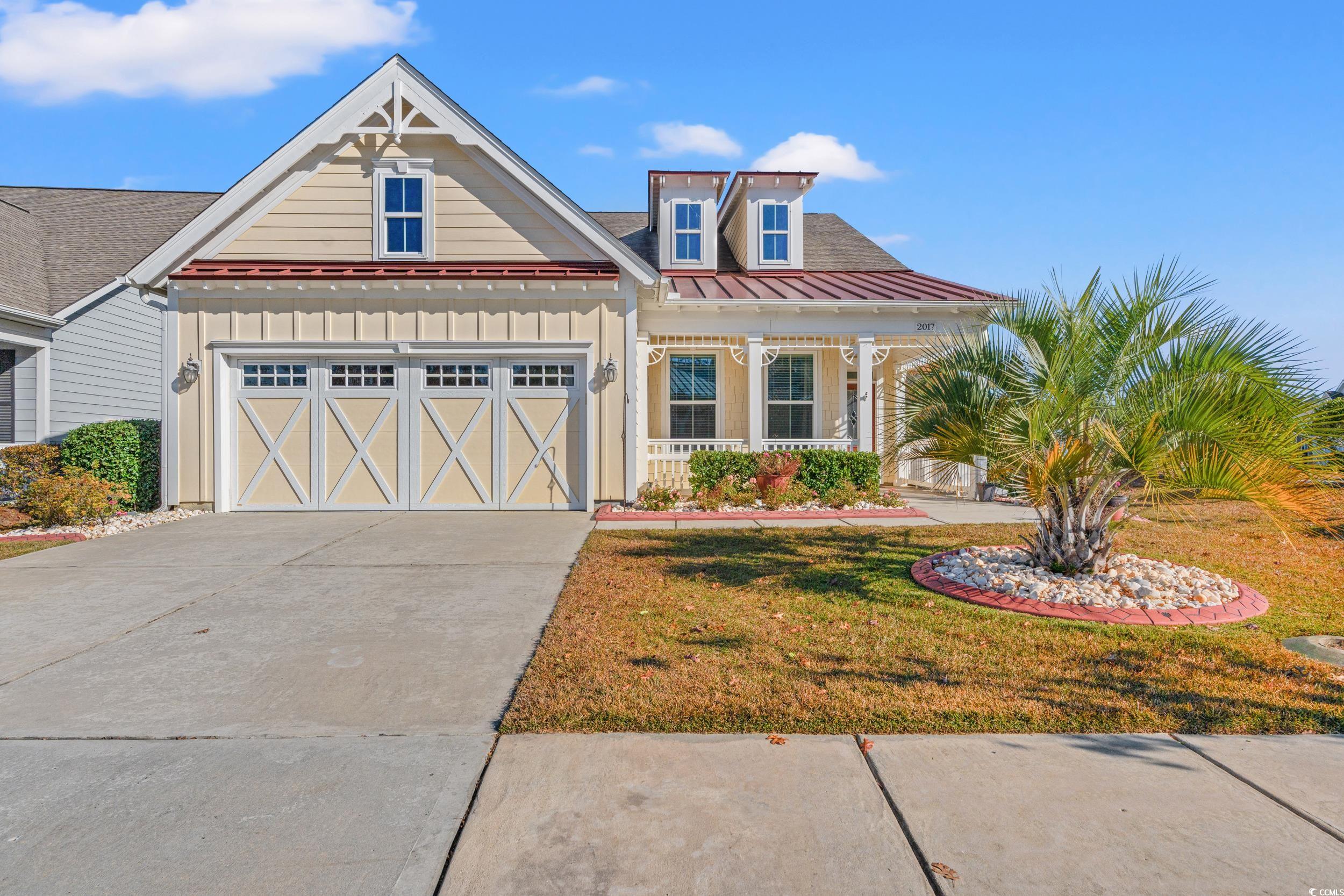 View of front of property featuring a front lawn