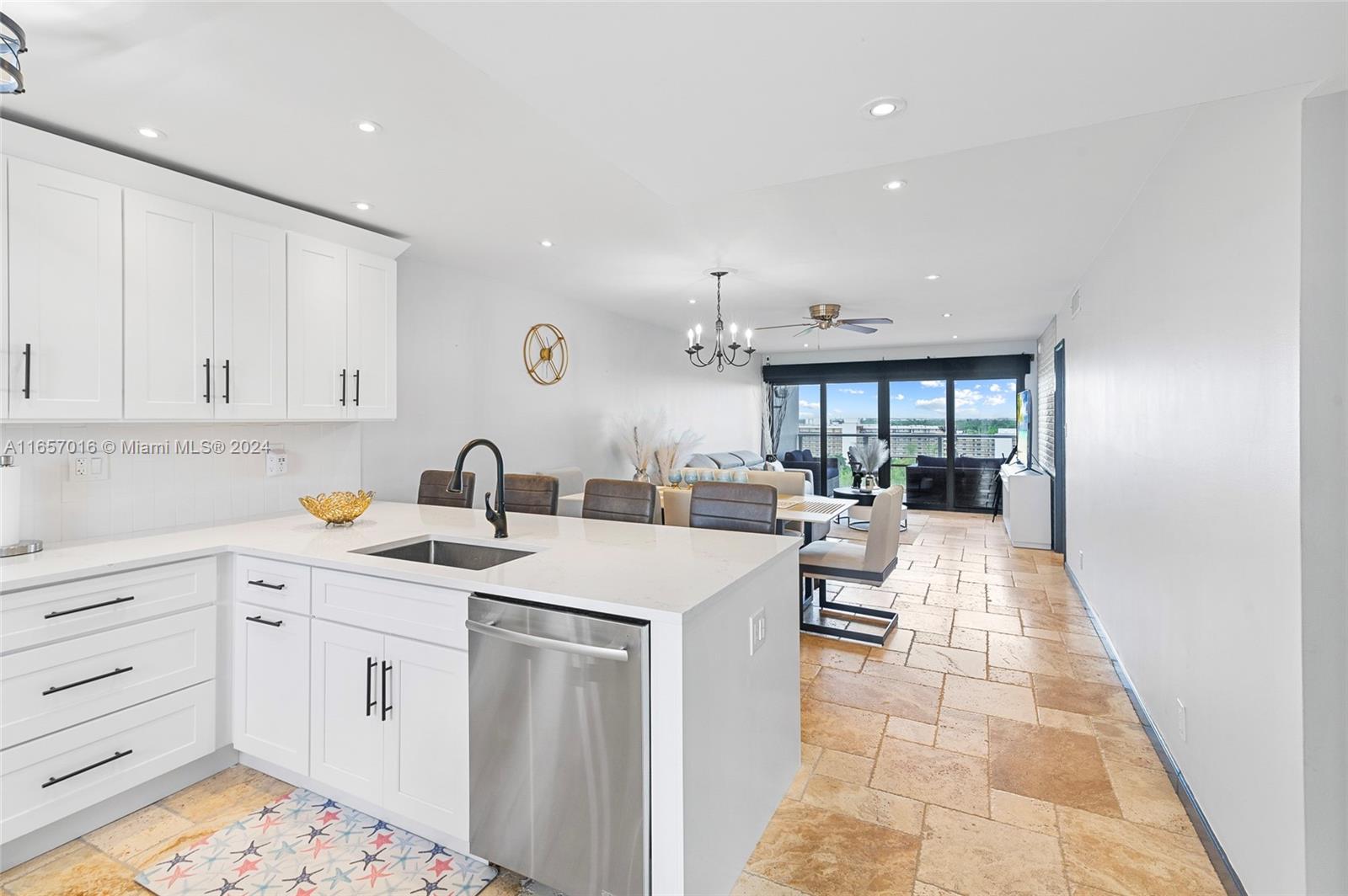 a view of a kitchen with cabinets