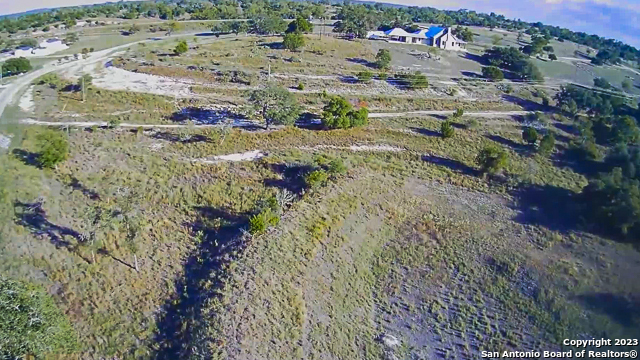 a view of a road with a yard