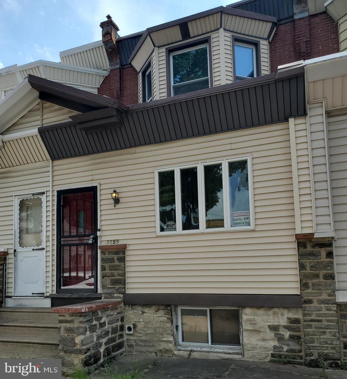 a front view of a house with a balcony