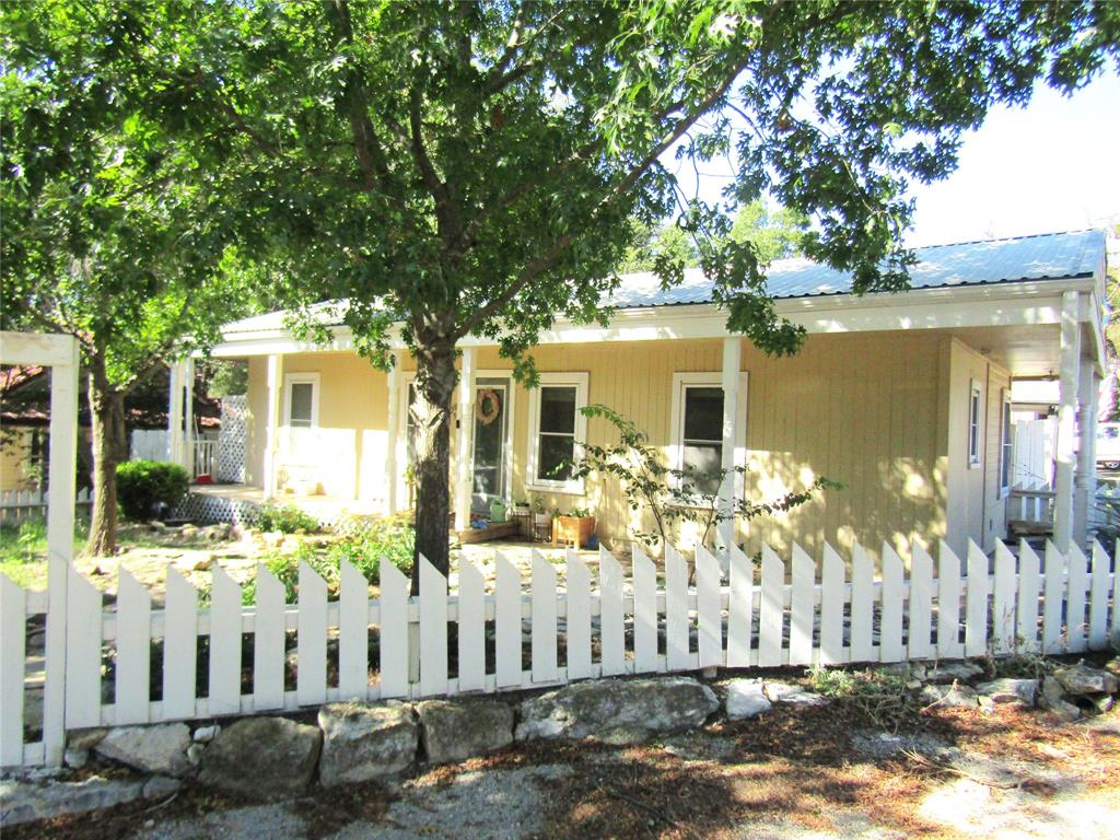 a front view of house with yard