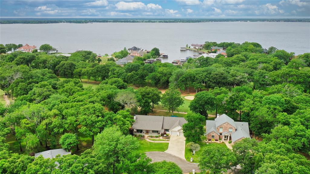 a aerial view of a house with a lake view