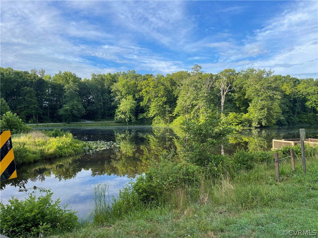 a view of a lake with a yard