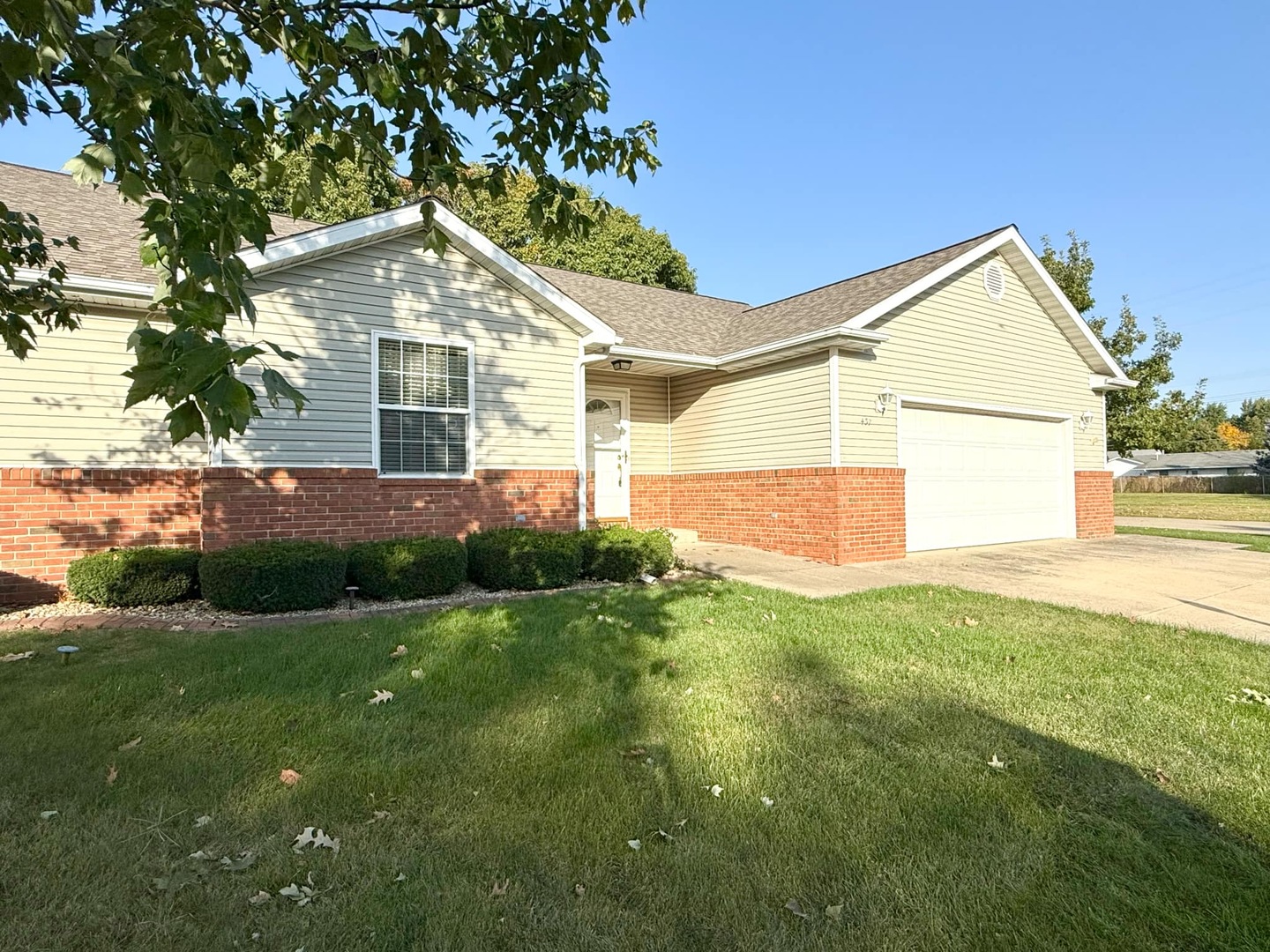 a view of front of house with a yard