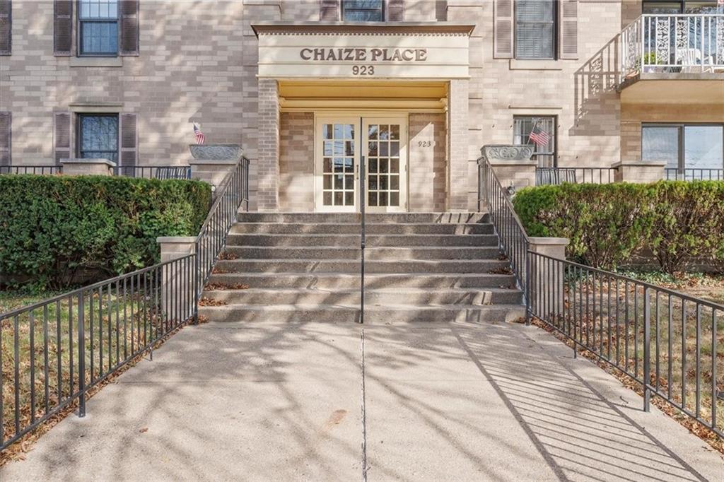 a front view of a building with stairs