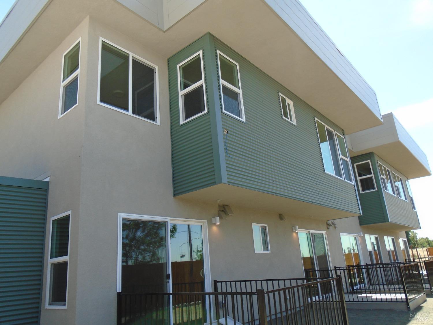 a front view of a house with parking