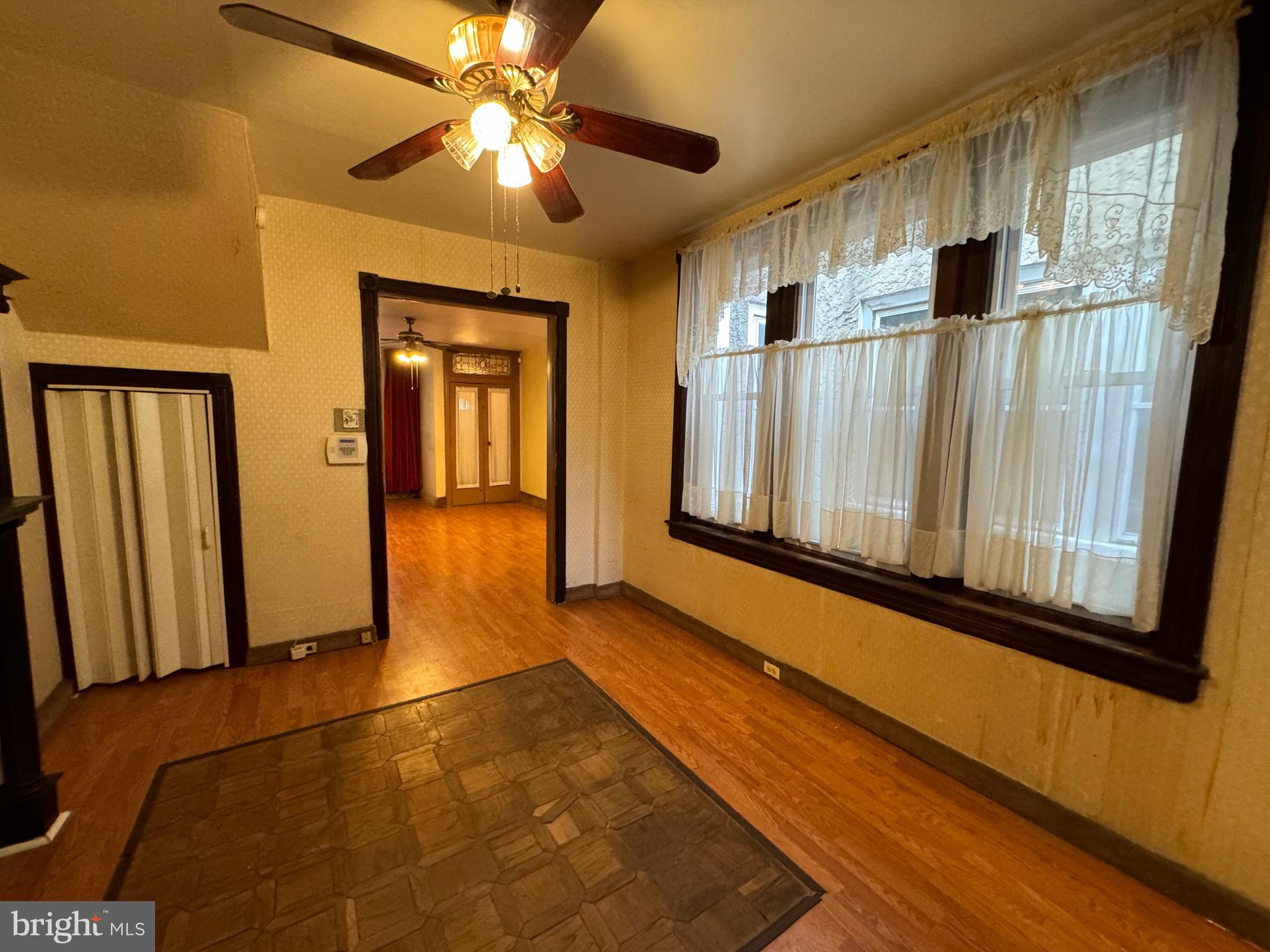 a view of gallery with wooden floor