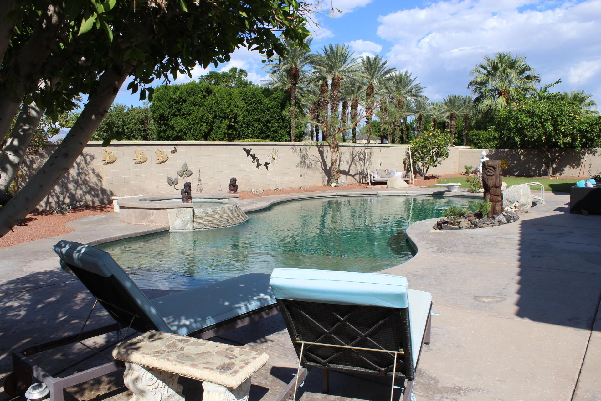 a view of outdoor sitting area with furniture