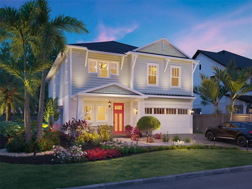 a front view of a house with a garden and plants