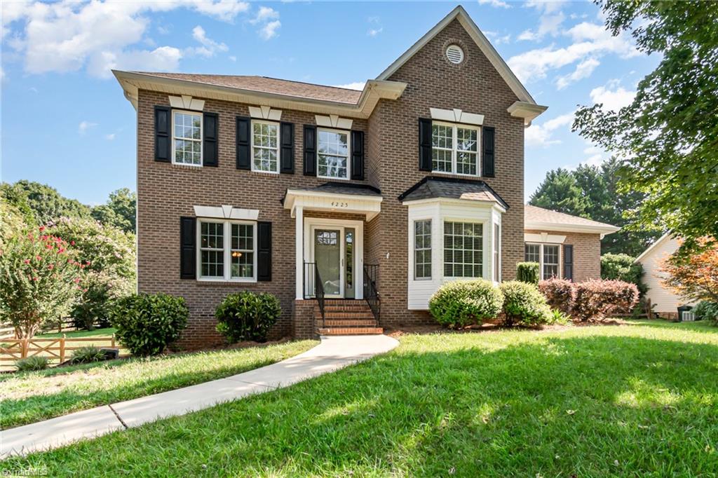 Beautiful Brick Front home with bay window.