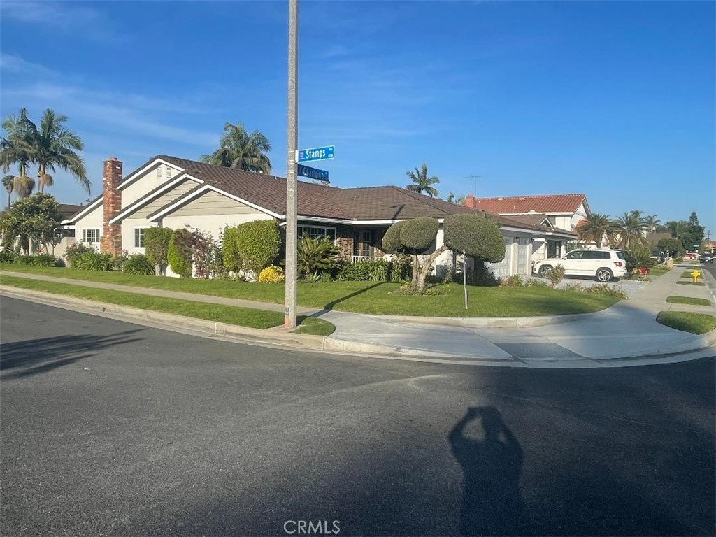 a view of a house with a street