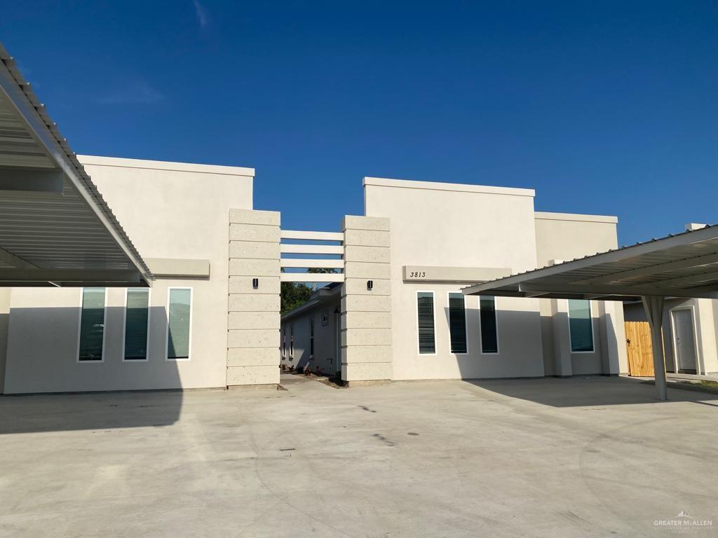 View of patio / terrace with a carport