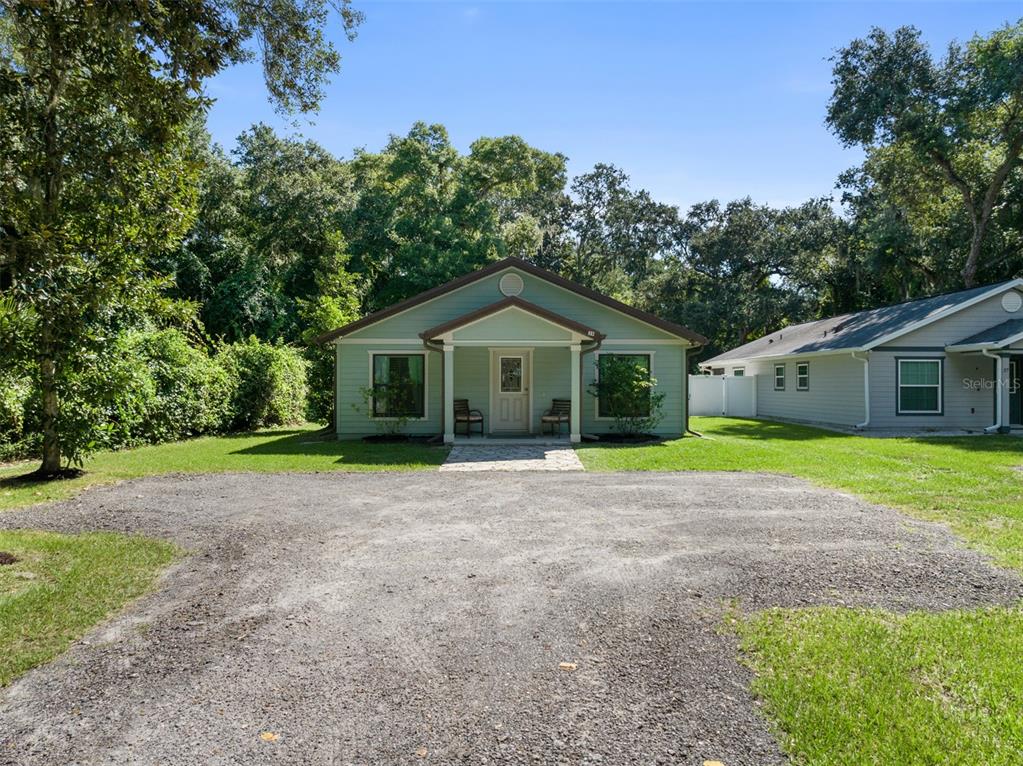 a house with yard in front of it