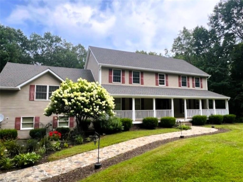 Front Porch Colonial with Beautiful landscaping