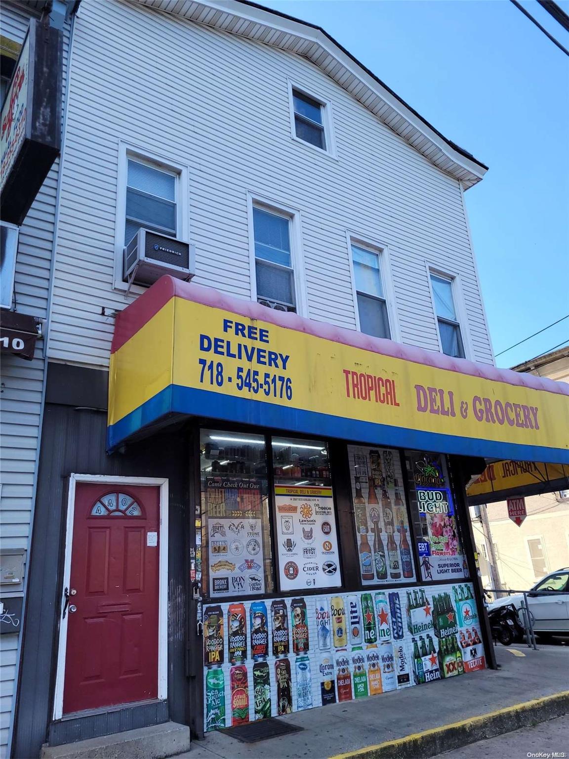 a view of a building with retail shop