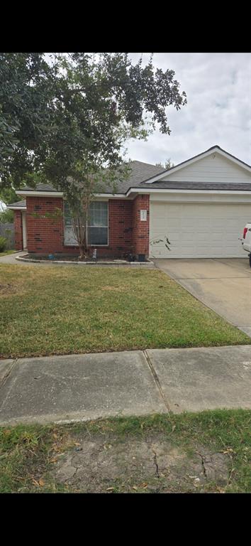 a view of a yard in front of a house