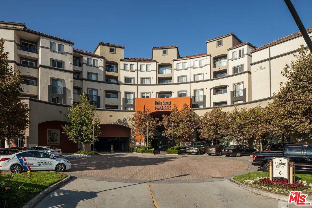 a front view of a building with street view