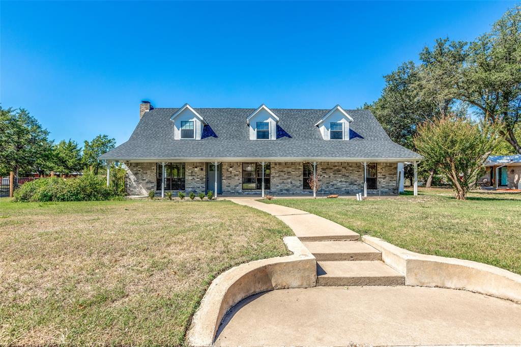 a front view of house with yard