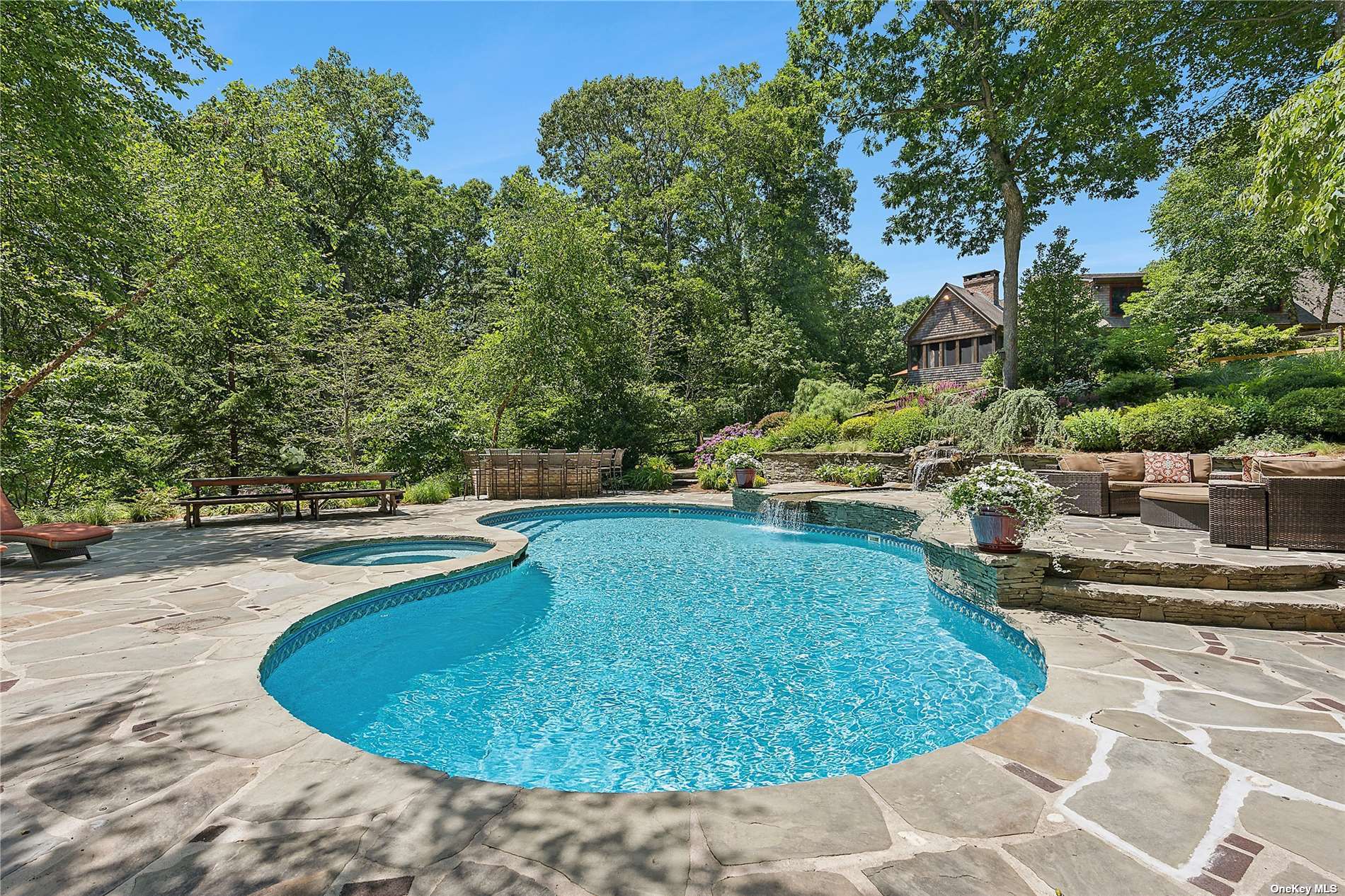 a view of a swimming pool with an outdoor space