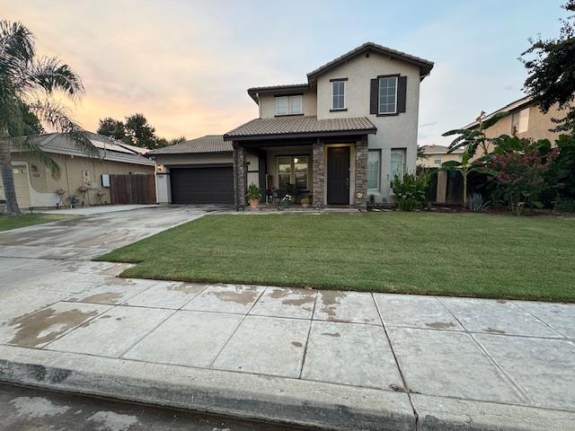 a view of a yard in front view of a house