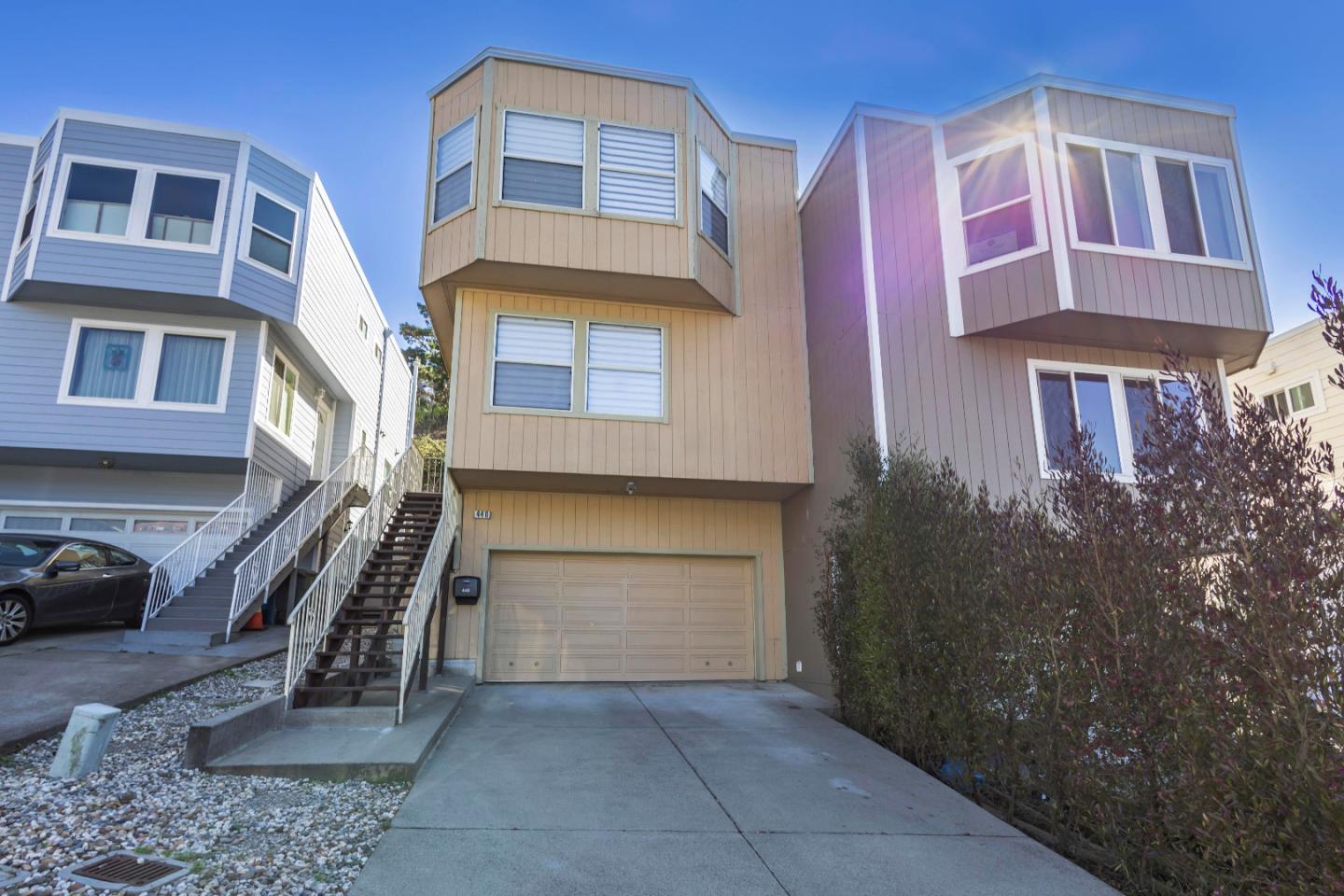 a front view of a multi story residential apartment building