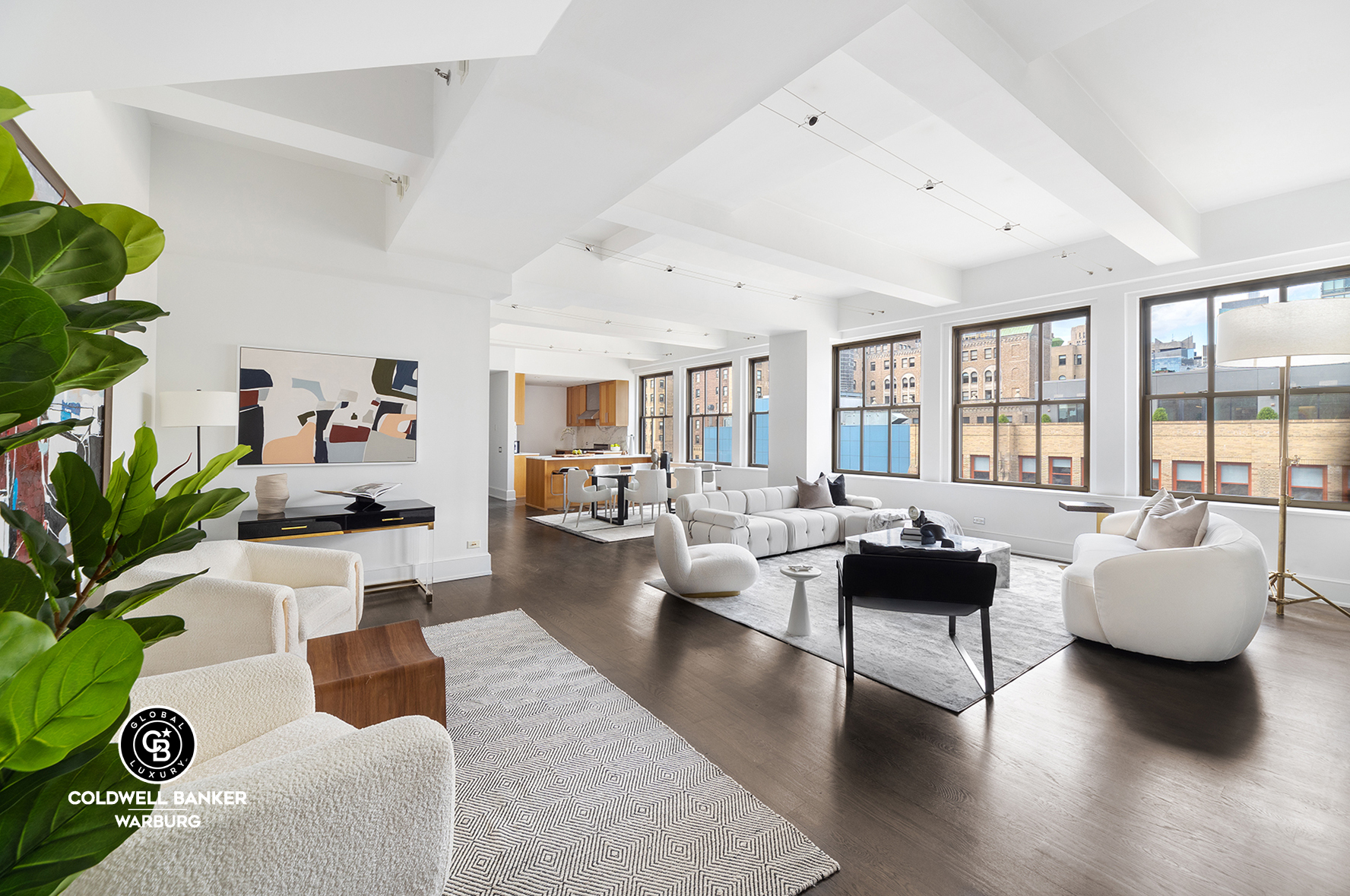 a living room with furniture or couch and a large window