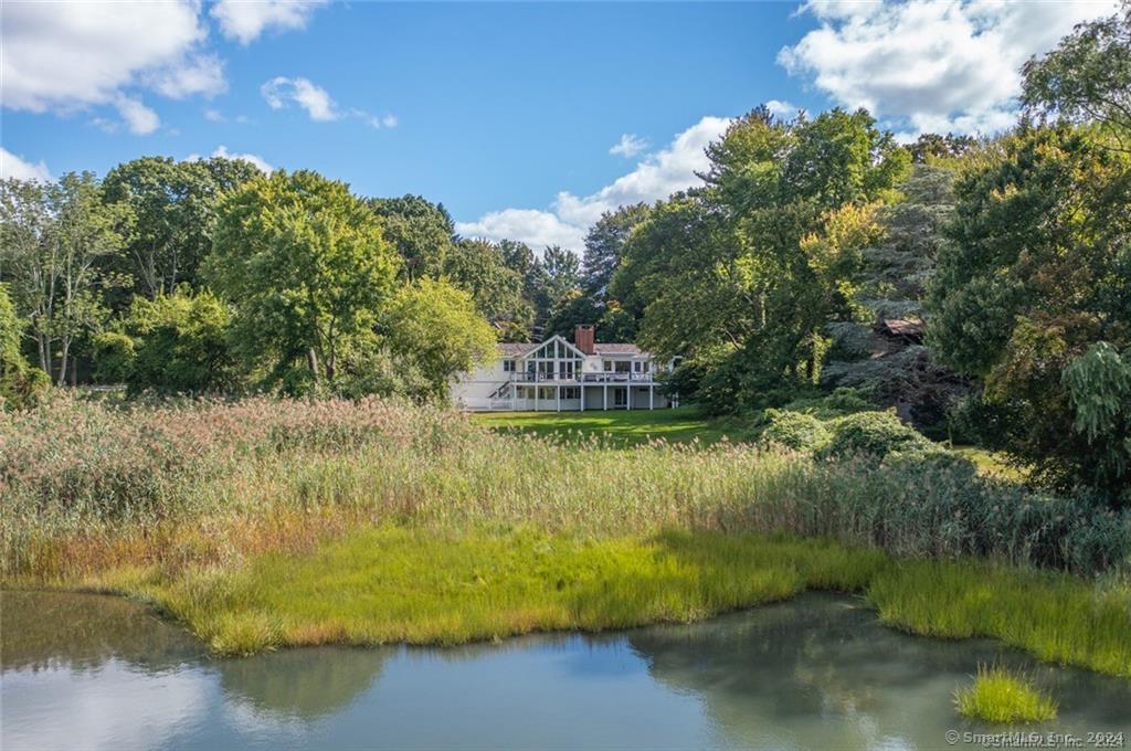 a view of a lake from a yard