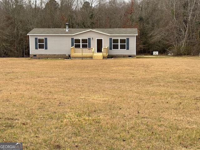 a front view of a house with yard