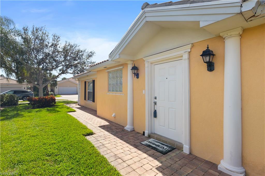 a front view of a house with yard