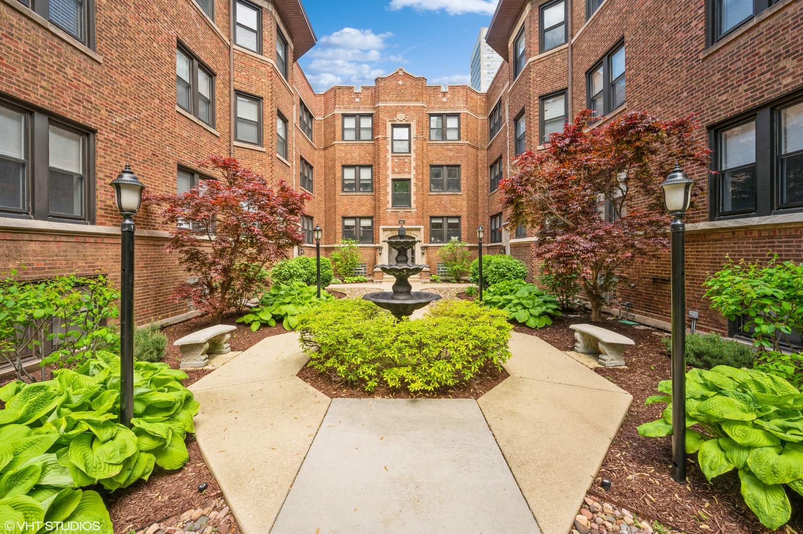 a view of a multi story residential apartment building